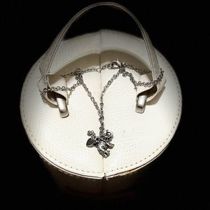 - Silver tone element heart pendent necklace